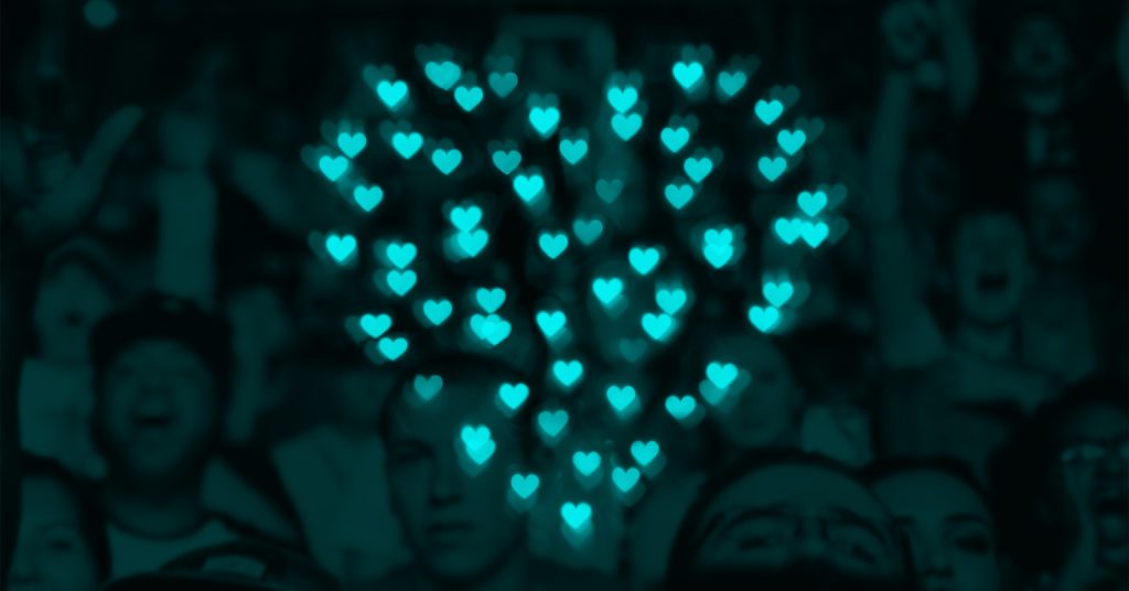 photo of a group of people with an overlay of a glowing heart